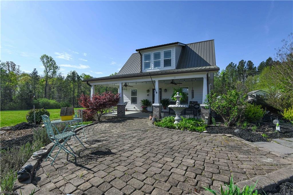7164 Ludgate Road Gibsonville, NC 27249 - Photo 4 of 50 Cottage - exterior view from front of lot