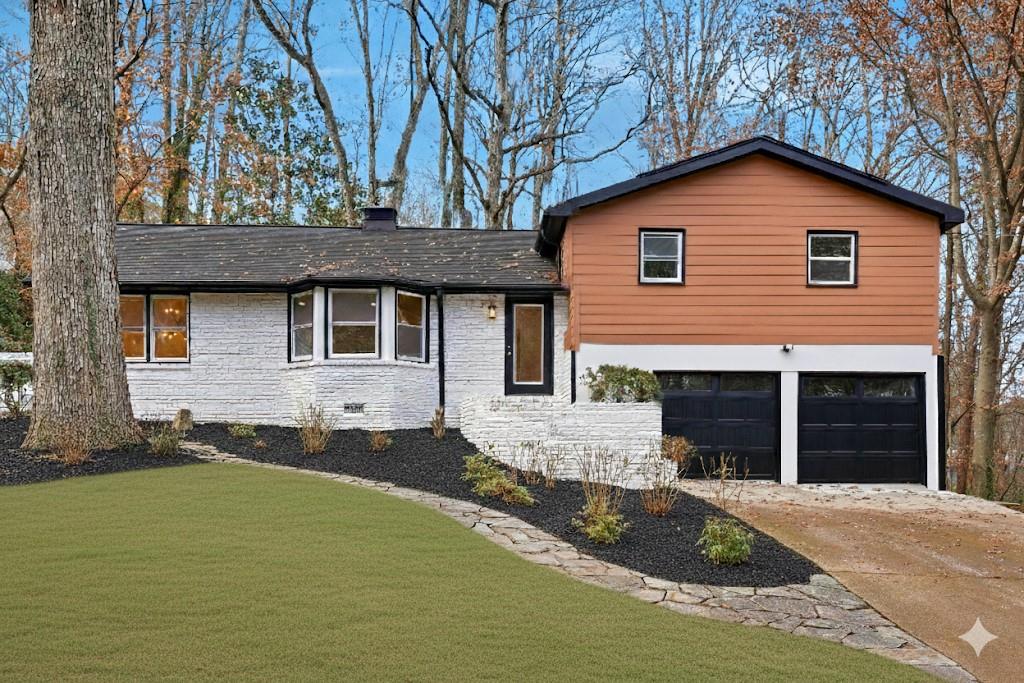 2520 Overlook Way Northeast Atlanta, GA 30345 - Photo 2 of 31 a front view of a house with a yard