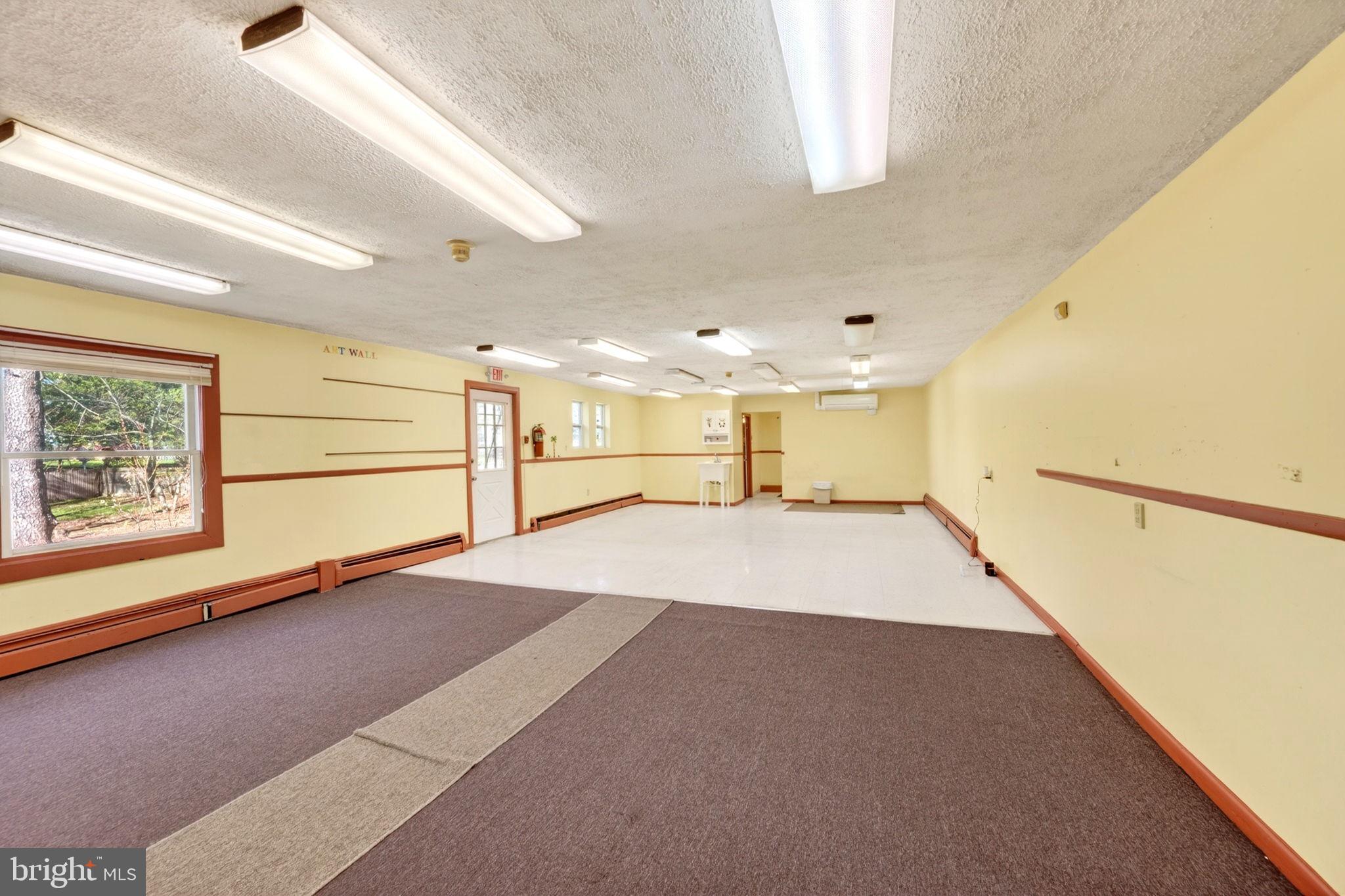 131 Midland Road Glen Burnie, MD 21060 - Photo 12 of 44 a view of an empty room with a window