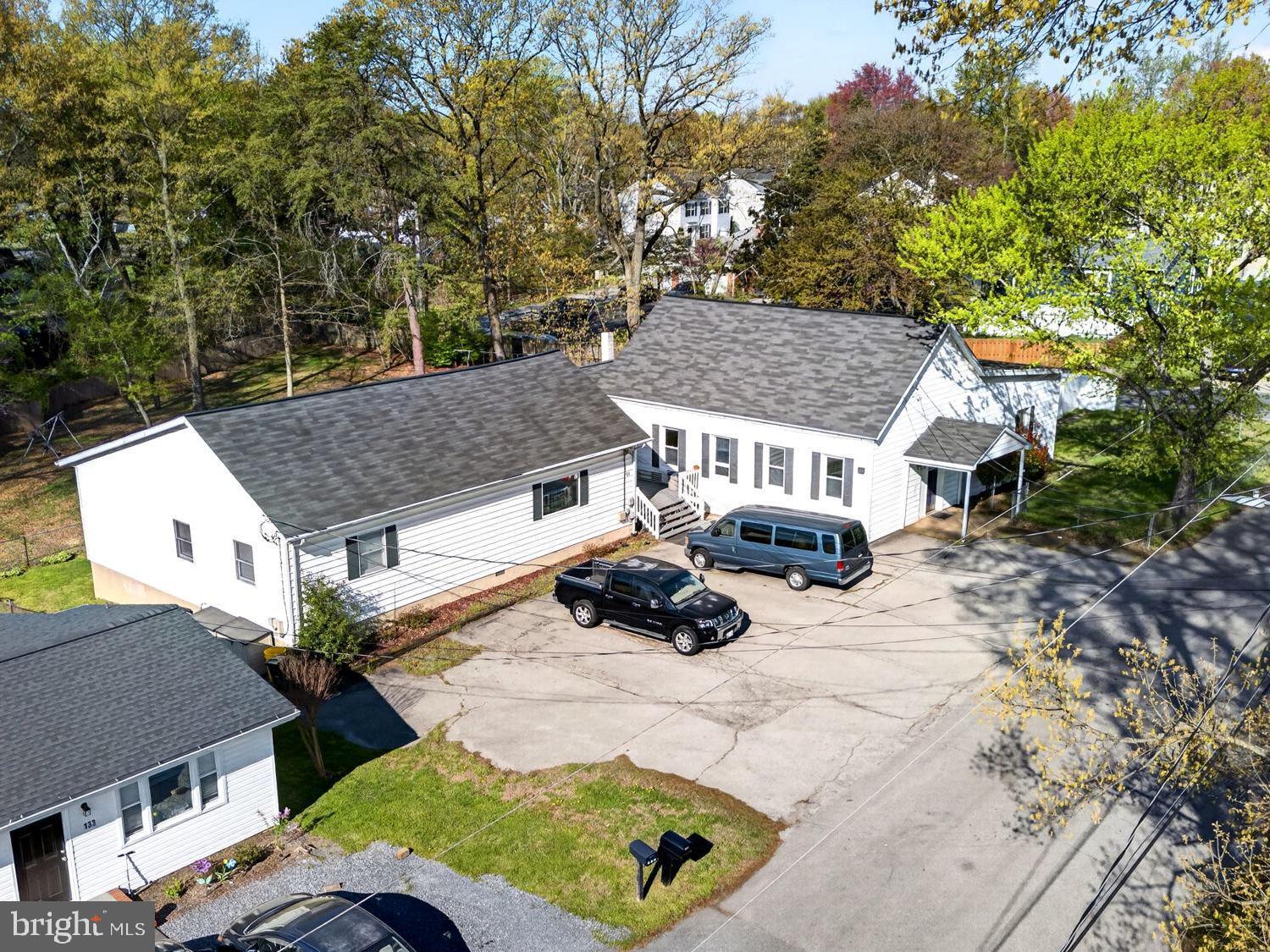 131 Midland Road Glen Burnie, MD 21060 - Photo 18 of 44 a view of a house with a yard