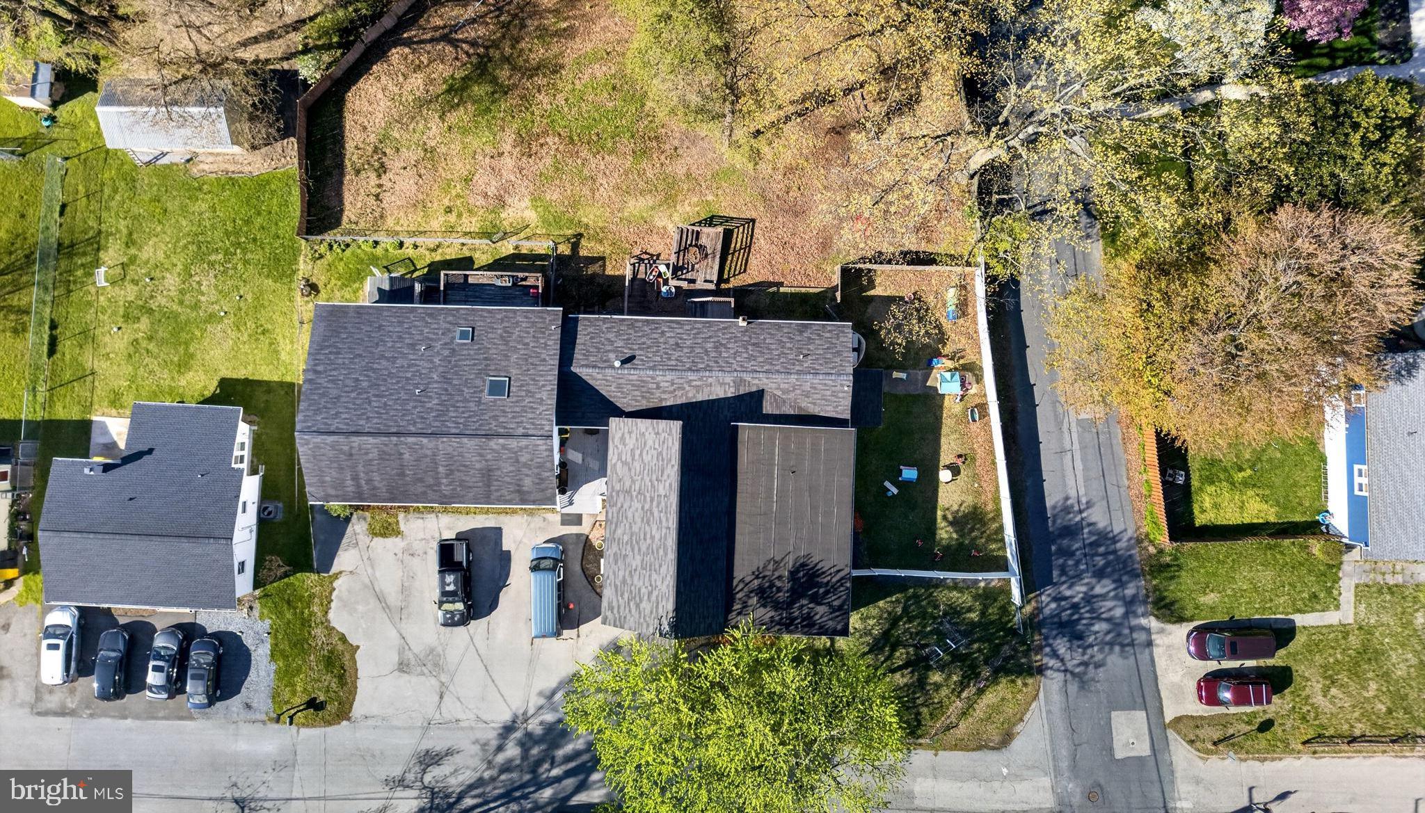 131 Midland Road Glen Burnie, MD 21060 - Photo 19 of 44 an aerial view of multiple houses with yard