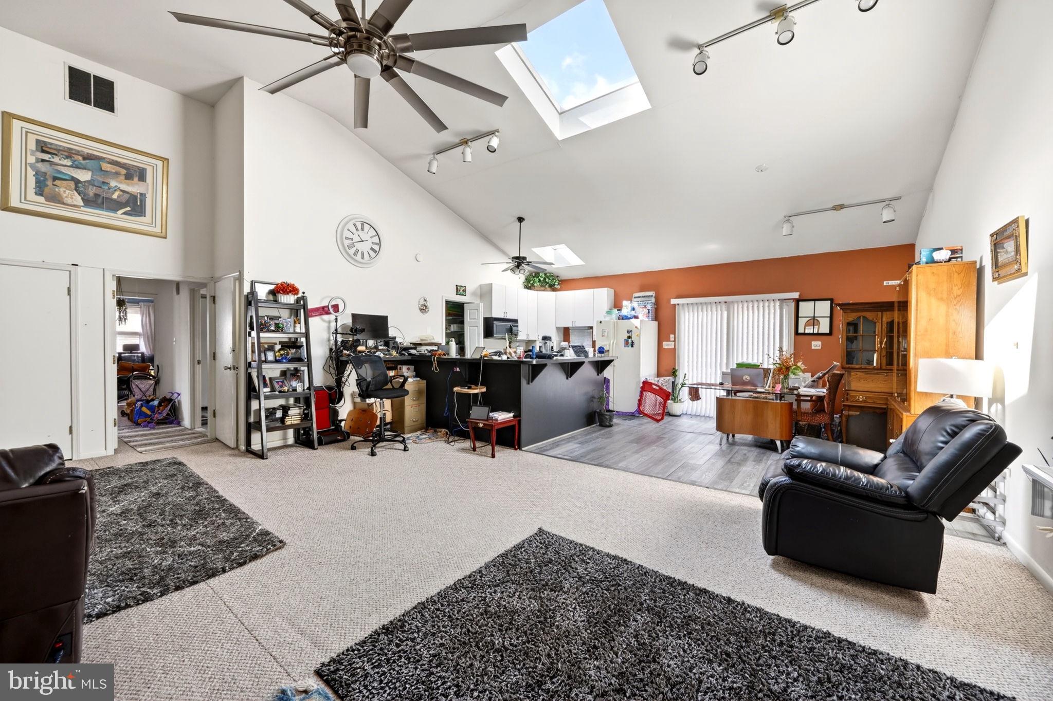 131 Midland Road Glen Burnie, MD 21060 - Photo 24 of 44 a living room with furniture and a large window