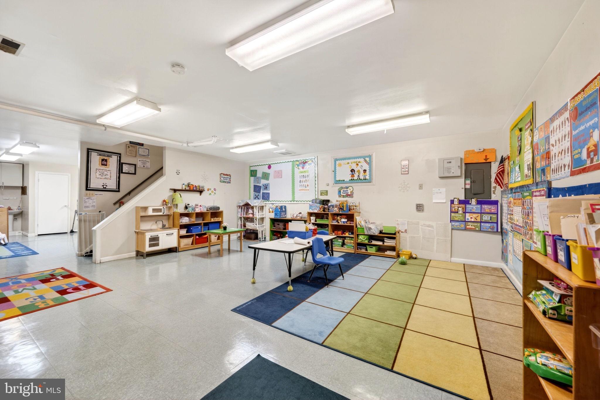 131 Midland Road Glen Burnie, MD 21060 - Photo 32 of 44 a living room with furniture and a couch
