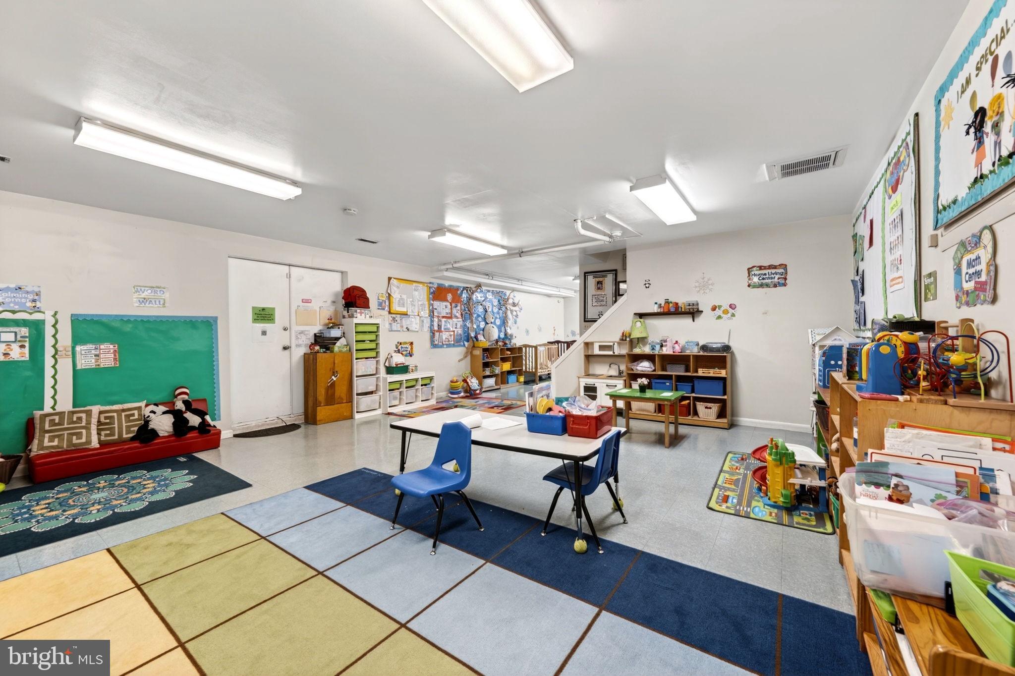 131 Midland Road Glen Burnie, MD 21060 - Photo 34 of 44 a room with lots of furniture and mountain view