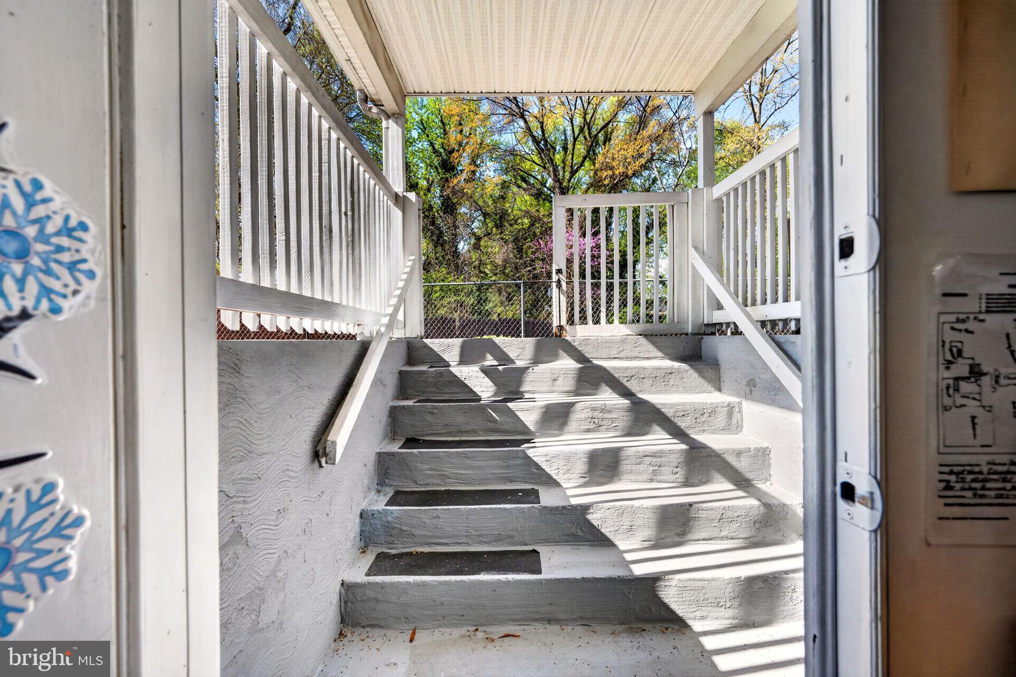 131 Midland Road Glen Burnie, MD 21060 - Photo 39 of 44 a view of staircase with white walls and windows
