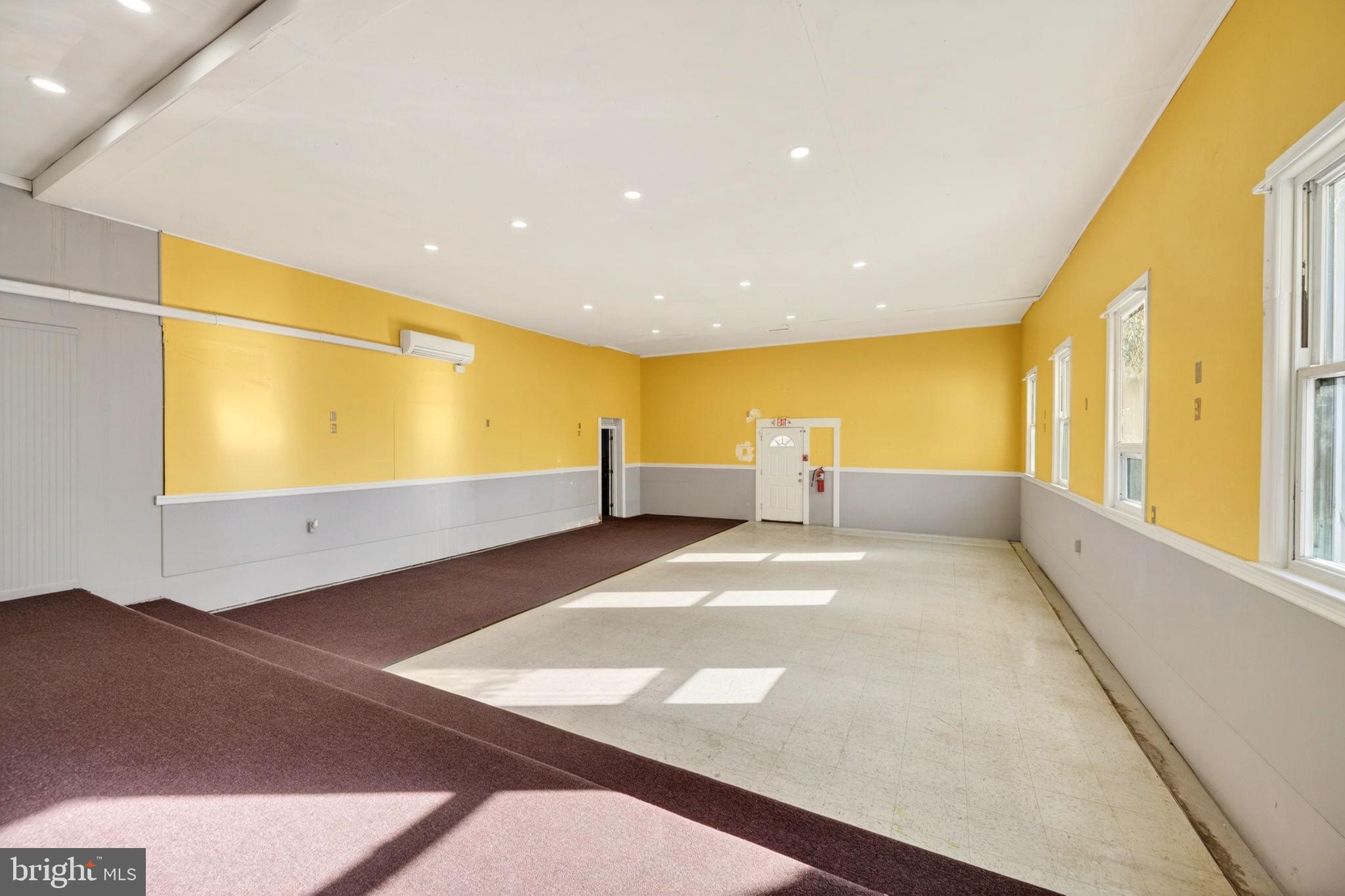 131 Midland Road Glen Burnie, MD 21060 - Photo 4 of 44 a view of game room with windows