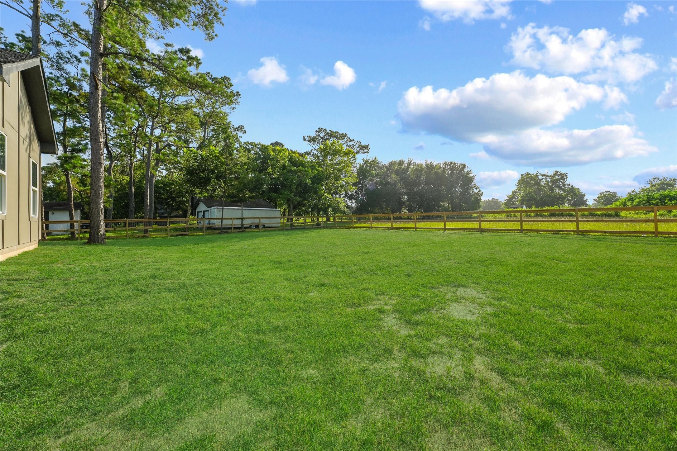 252 Davis Bend Road Alvin, TX 77511 - Photo 29 of 32 a view of a golf course with a lake