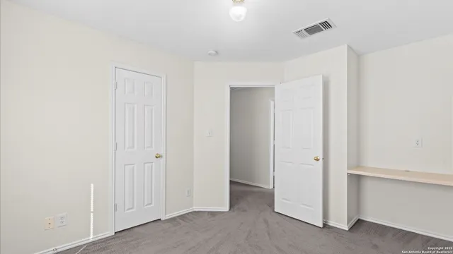 a view of a room with closet area