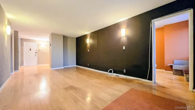 a view of an empty room and window