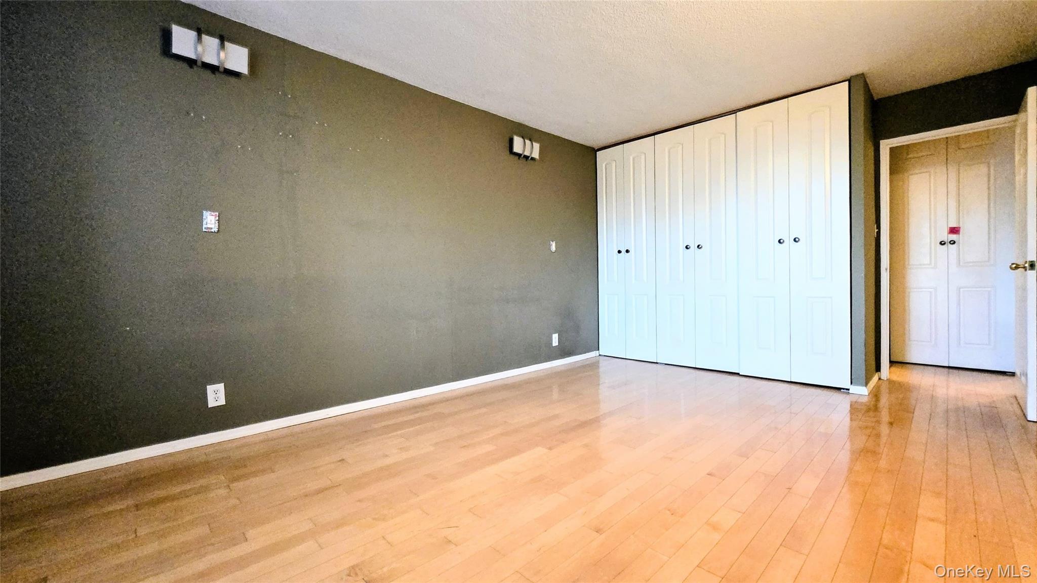 118-18 Union Turnpike, Unit 4B Queens, NY 11415 - Photo 21 of 30 a view of an empty room