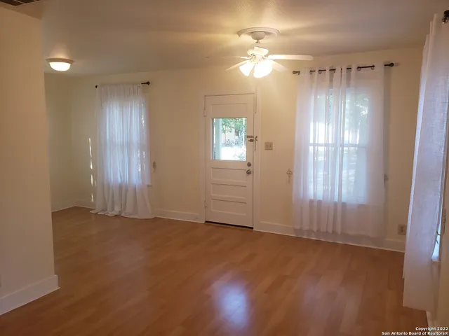 a view of a bathroom with a glass door