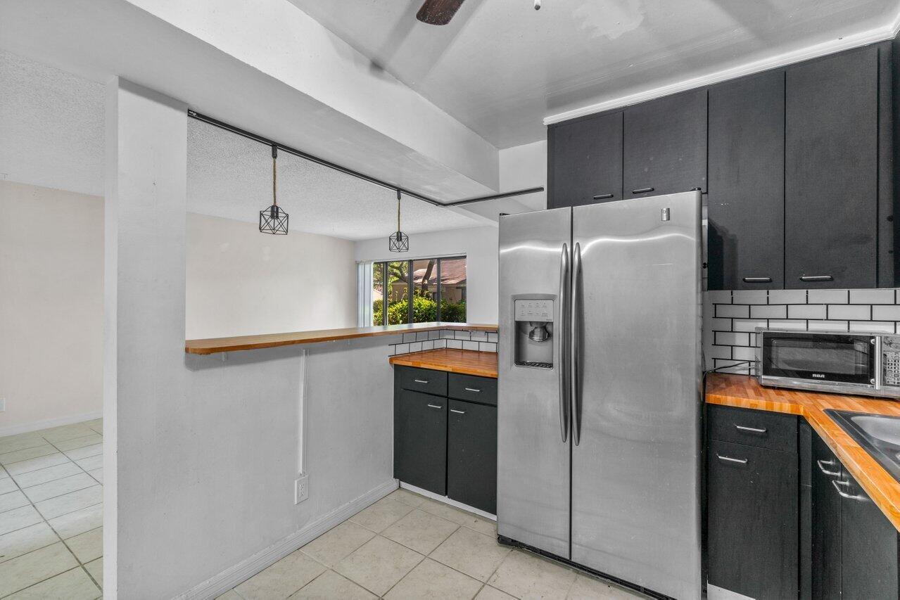 1149 Northwest 13th Street, Unit 5 Boca Raton, FL 33486 - Photo 5 of 24 009-1149Northwest13thStreet-BocaRaton-FL