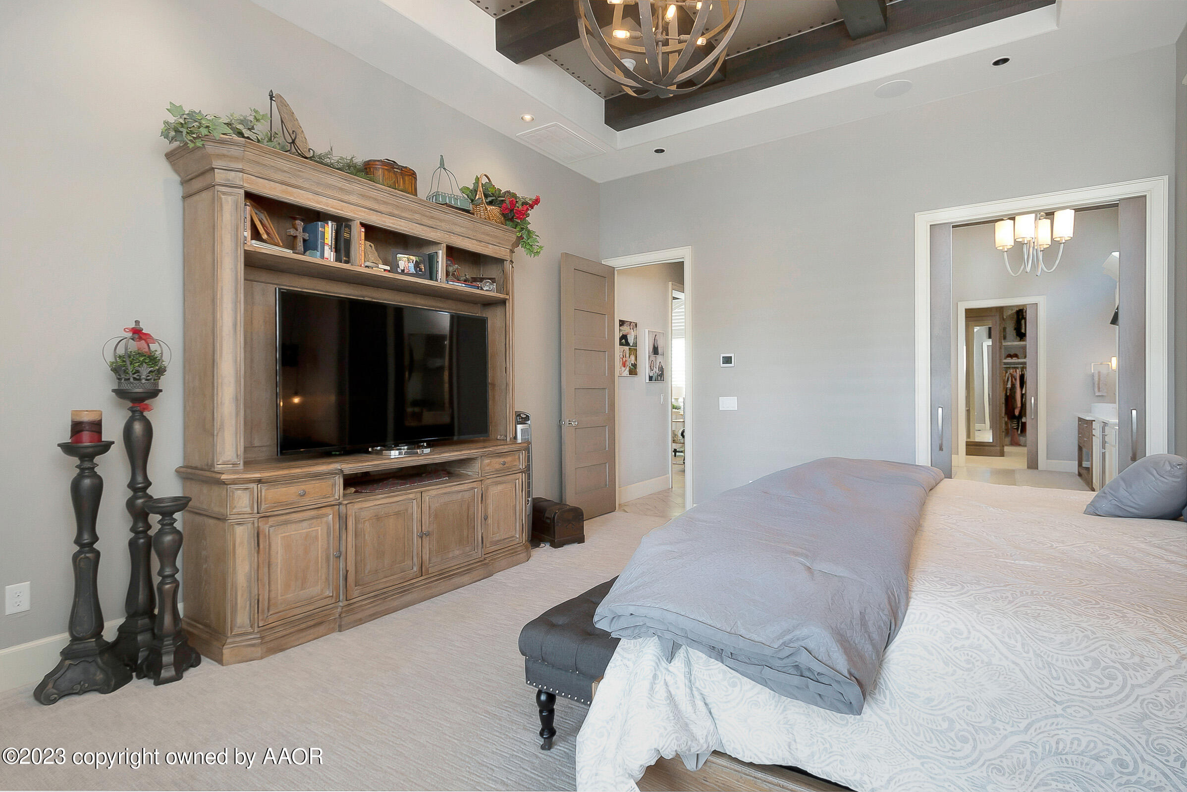 8100 Georgetown Drive Amarillo, TX 79119 - Photo 24 of 56 a bedroom with furniture and a flat screen tv