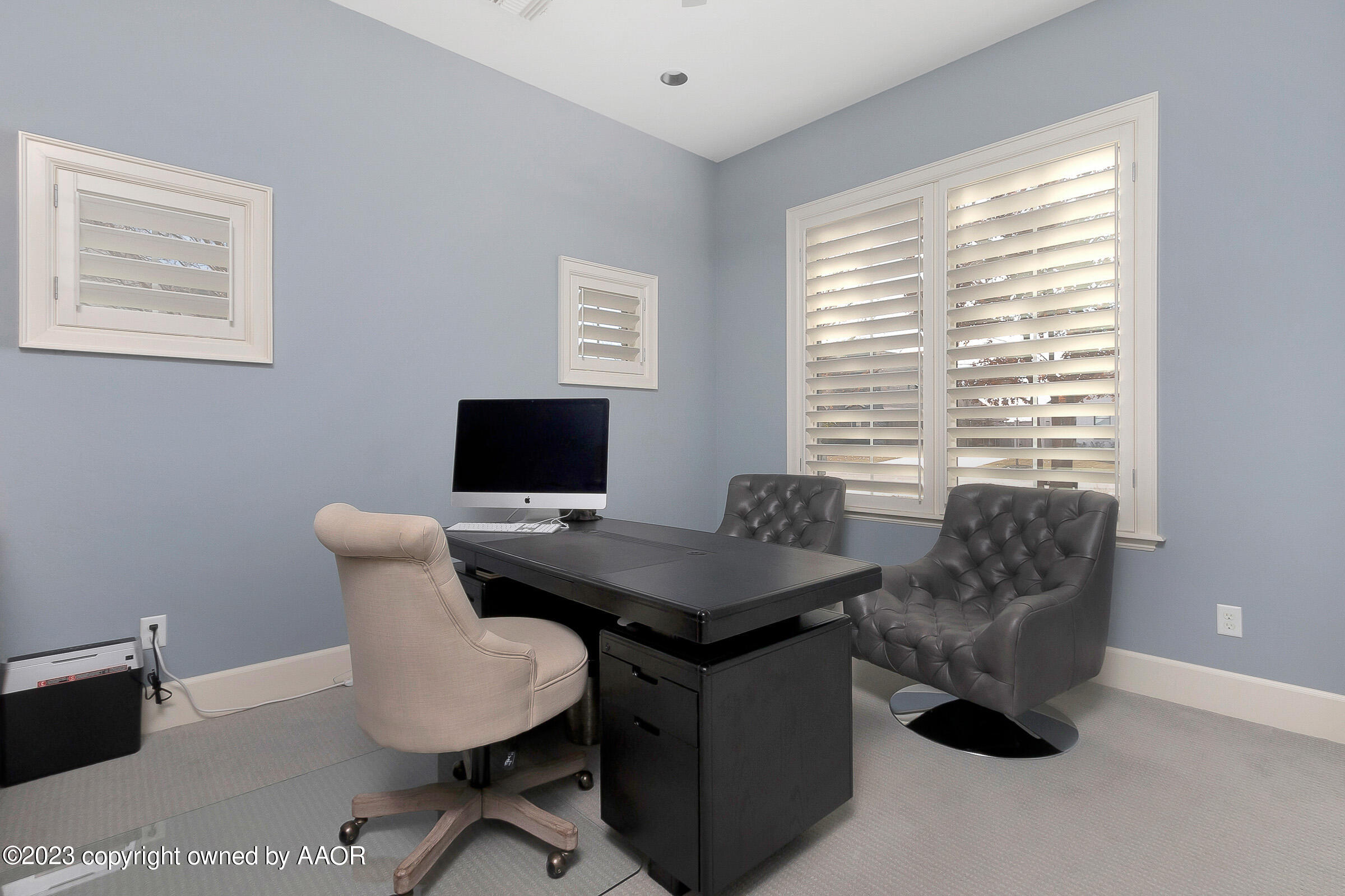 8100 Georgetown Drive Amarillo, TX 79119 - Photo 37 of 56 a view of a workspace with furniture and a window