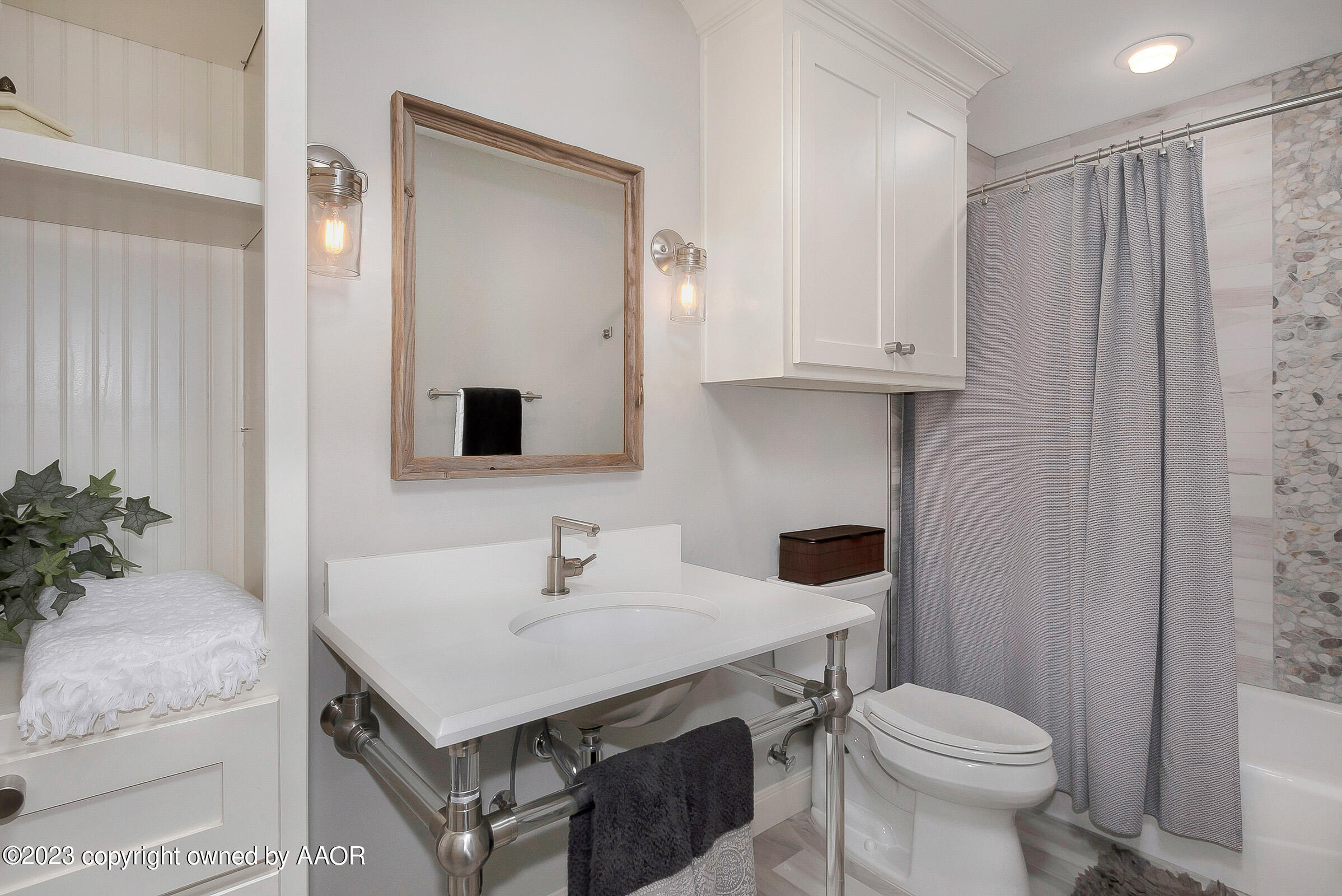 8100 Georgetown Drive Amarillo, TX 79119 - Photo 44 of 56 a bathroom with a sink toilet and shower