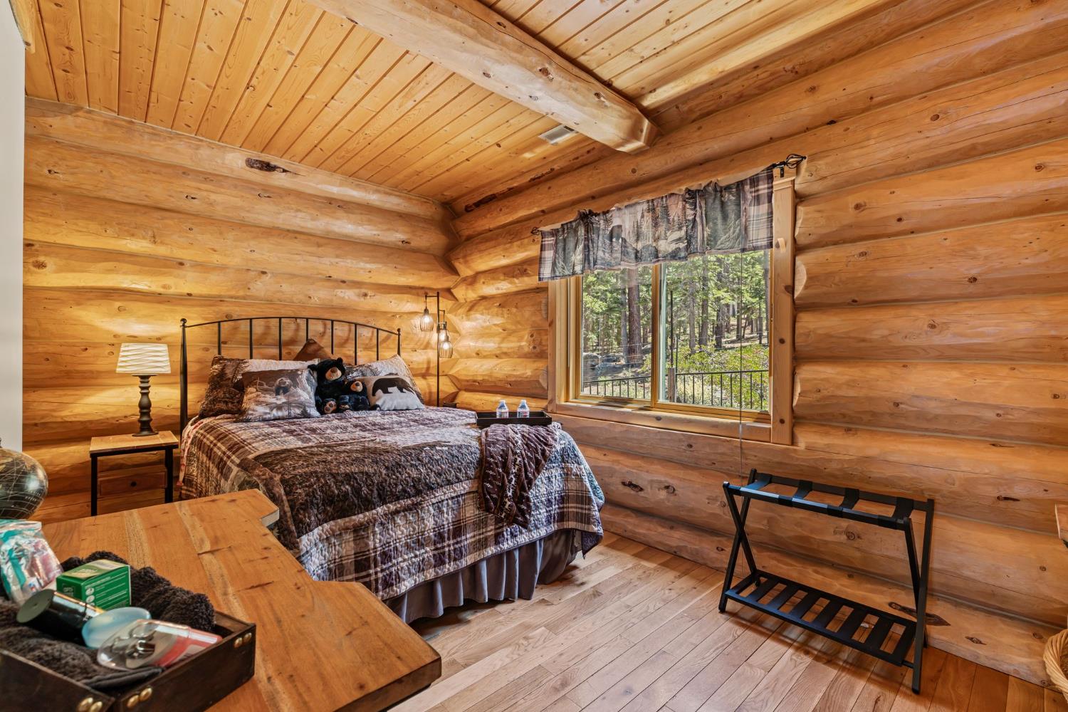 3589 Rocky Point Road South Lake Tahoe, CA 96150 - Photo 27 of 95 a bed room with furniture and a window