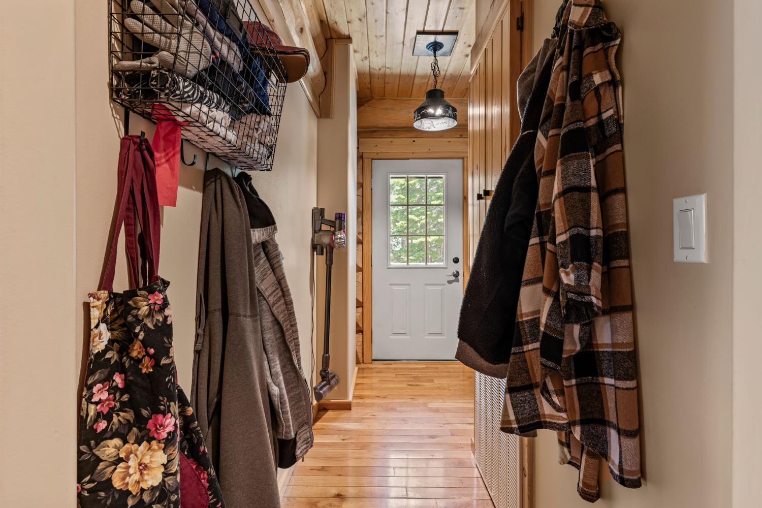 3589 Rocky Point Road South Lake Tahoe, CA 96150 - Photo 30 of 95 a view of walk in closet with clothes and shoes