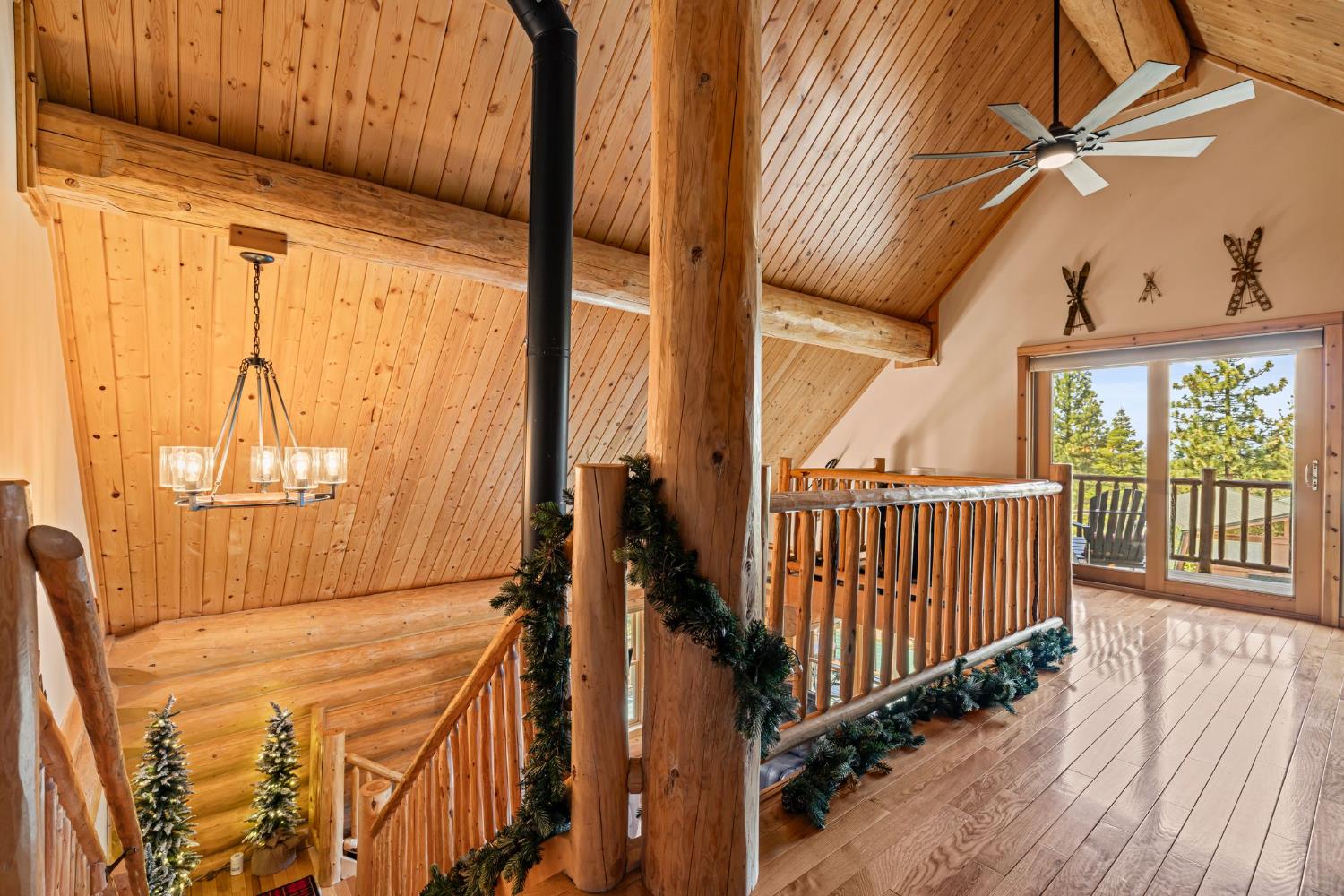 3589 Rocky Point Road South Lake Tahoe, CA 96150 - Photo 32 of 95 a view of a balcony with wooden floor