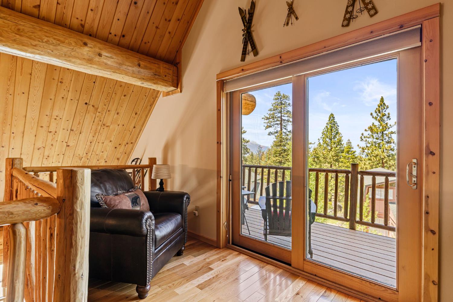 3589 Rocky Point Road South Lake Tahoe, CA 96150 - Photo 33 of 95 a view of a balcony with chairs and wooden floor
