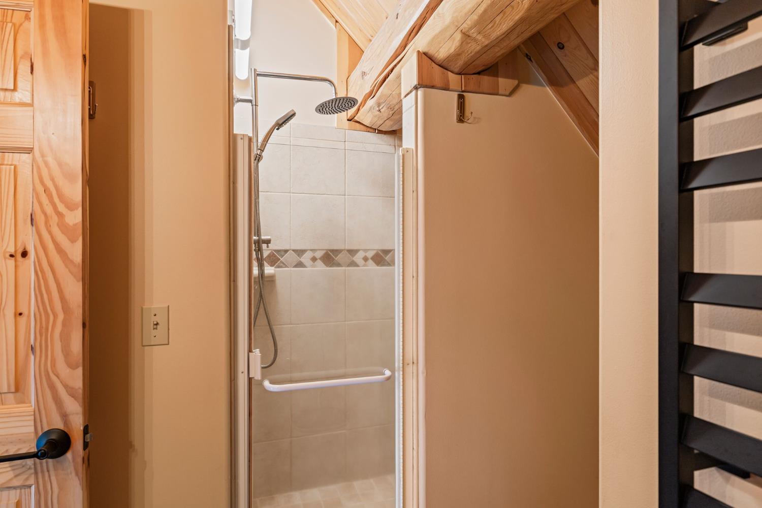 3589 Rocky Point Road South Lake Tahoe, CA 96150 - Photo 44 of 95 a bathroom with a shower