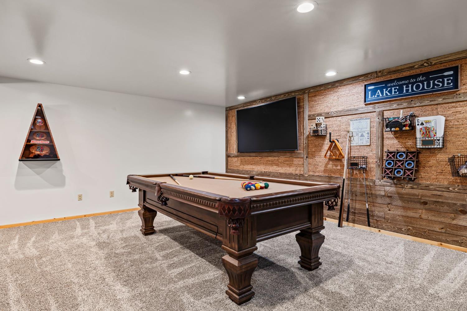 3589 Rocky Point Road South Lake Tahoe, CA 96150 - Photo 48 of 95 a living room with furniture pool table and a flat screen tv