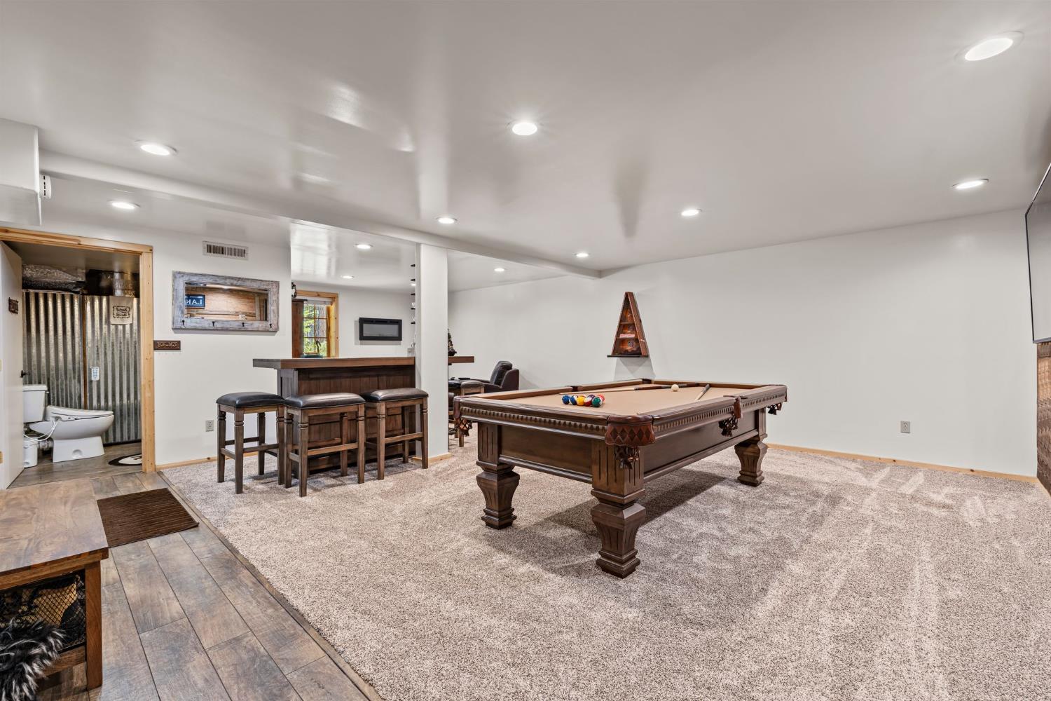 3589 Rocky Point Road South Lake Tahoe, CA 96150 - Photo 49 of 95 a living room with furniture and a table