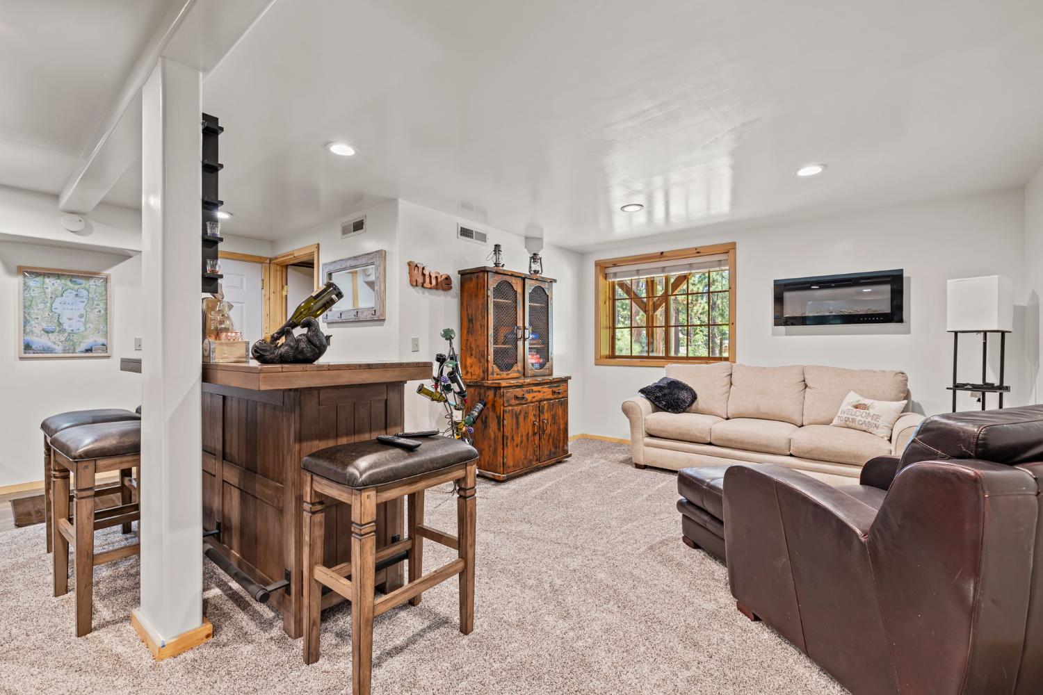 3589 Rocky Point Road South Lake Tahoe, CA 96150 - Photo 53 of 95 a living room with furniture and a window