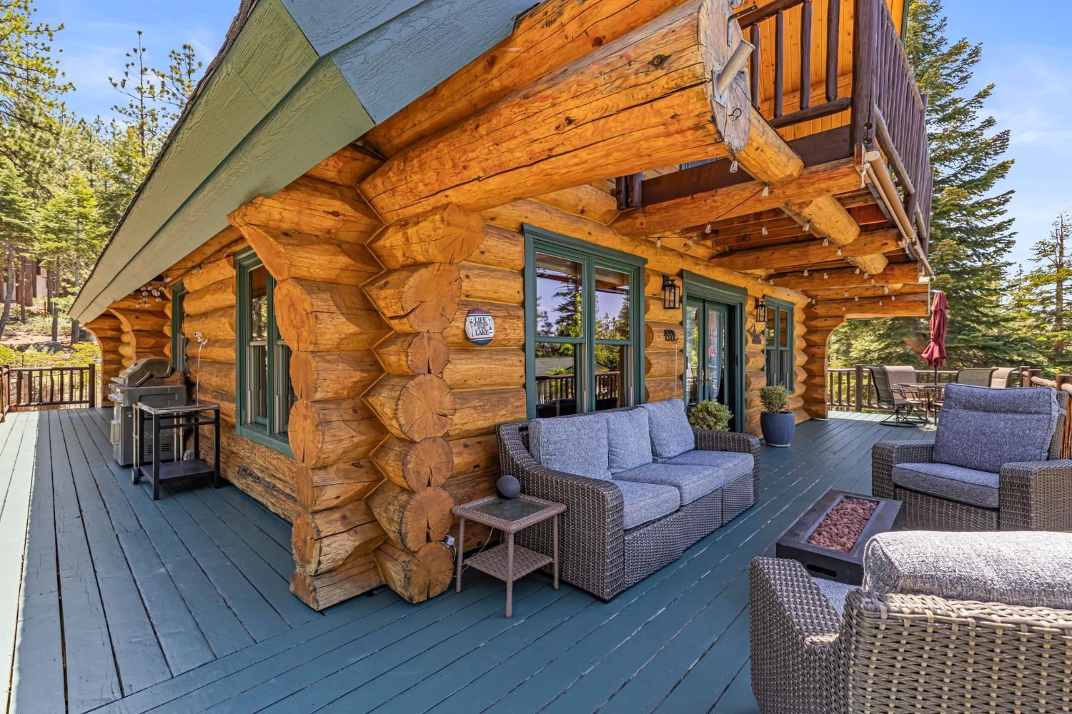 3589 Rocky Point Road South Lake Tahoe, CA 96150 - Photo 65 of 95 a outdoor space with patio furniture and wooden floor