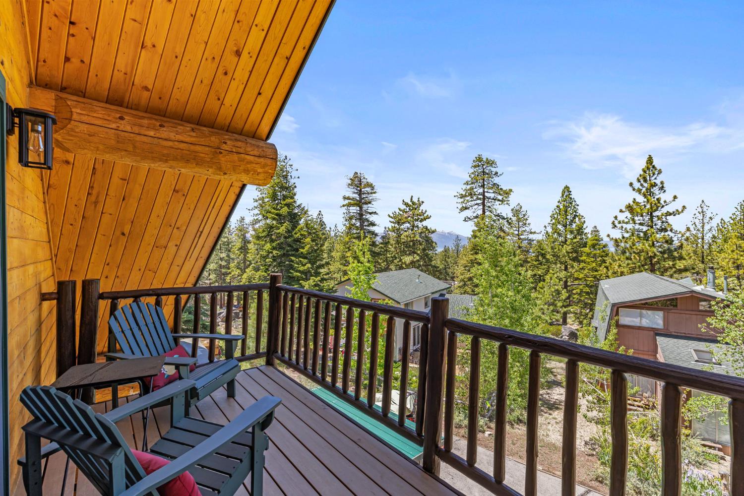 3589 Rocky Point Road South Lake Tahoe, CA 96150 - Photo 70 of 95 a view of a balcony with wooden floor and outdoor seating