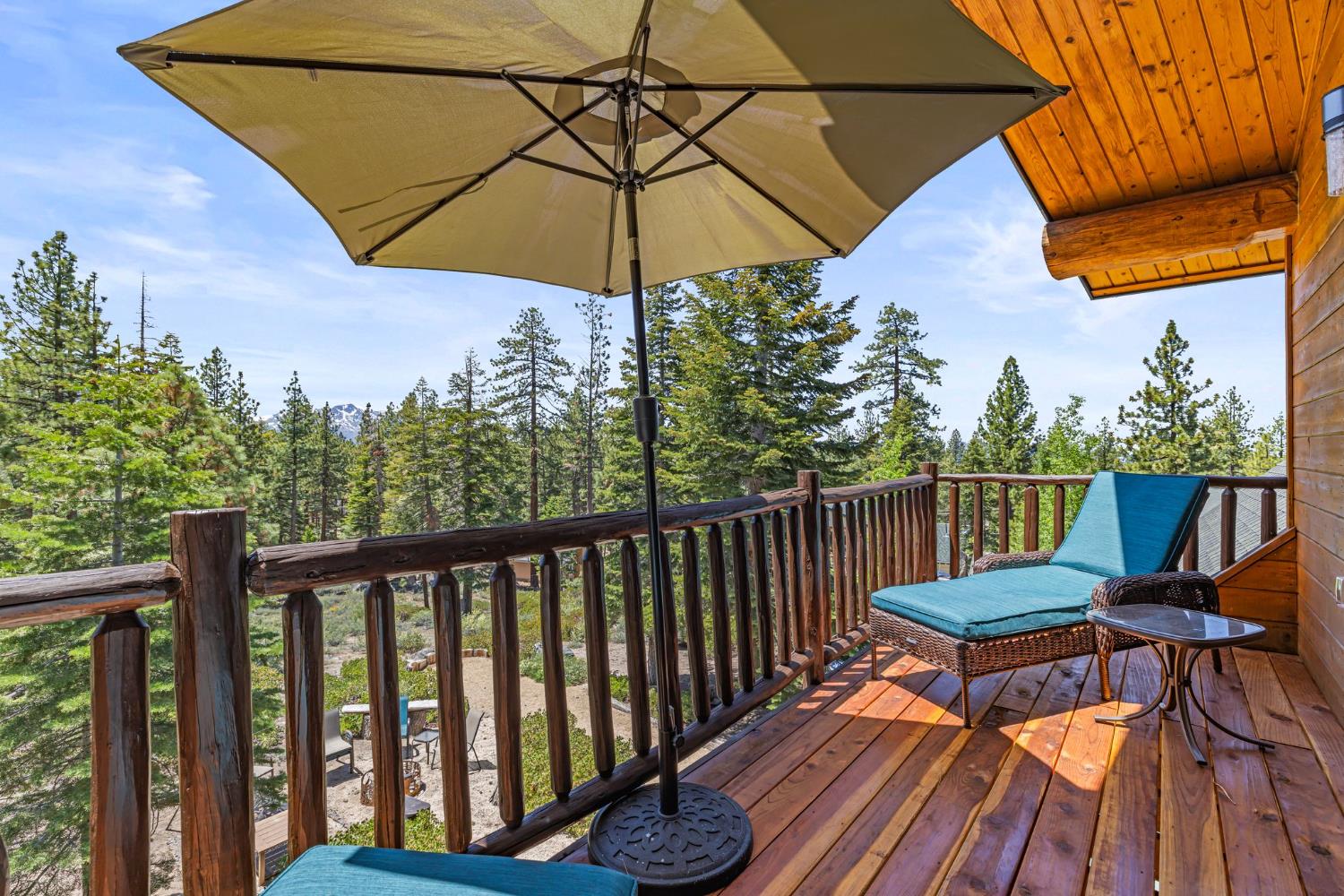 3589 Rocky Point Road South Lake Tahoe, CA 96150 - Photo 71 of 95 a view of a balcony with chairs and wooden fence