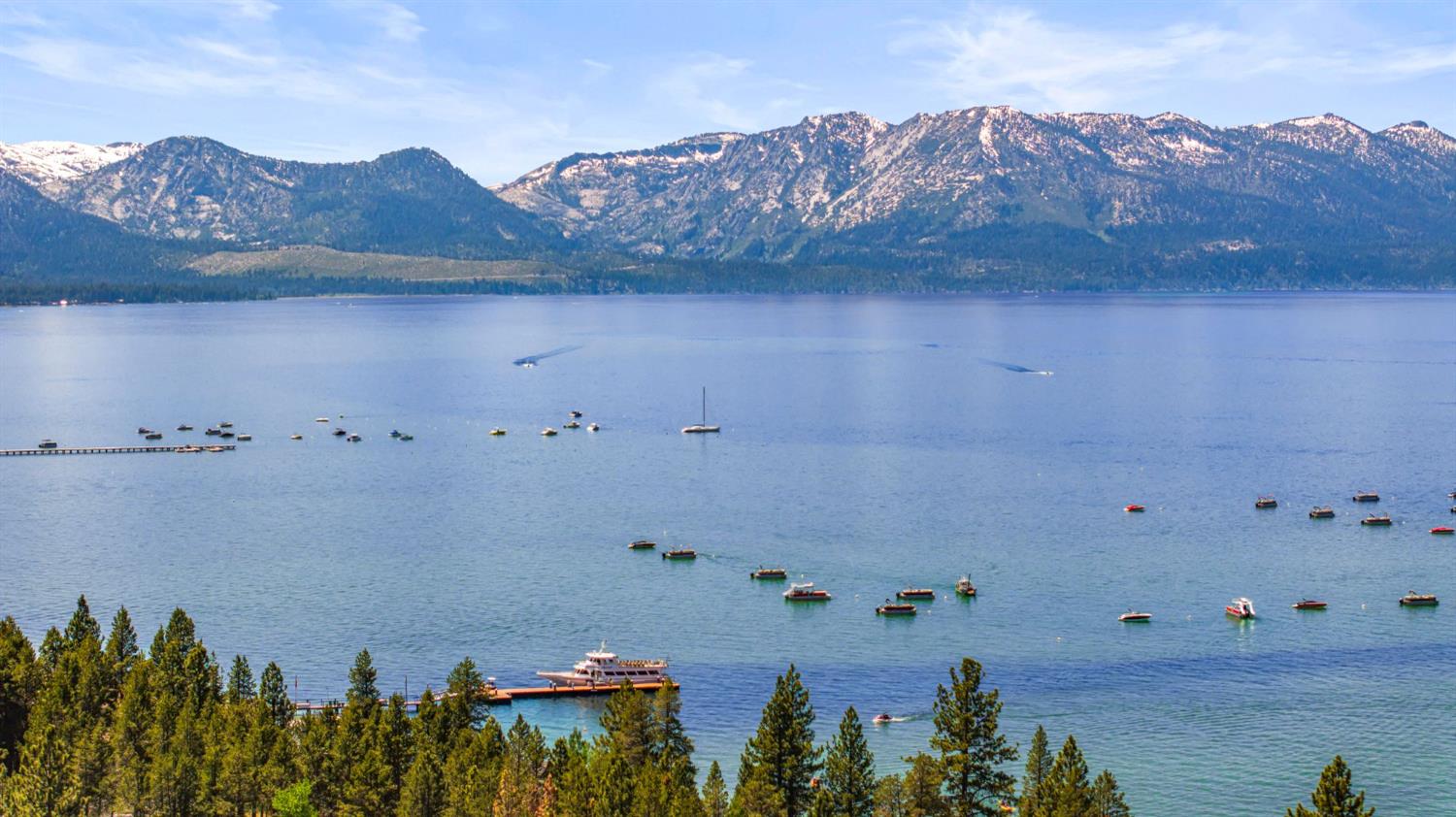 3589 Rocky Point Road South Lake Tahoe, CA 96150 - Photo 88 of 95 a view of a lake with a mountain in the background