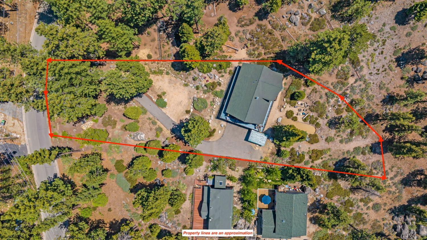 3589 Rocky Point Road South Lake Tahoe, CA 96150 - Photo 95 of 95 an aerial view of residential house with outdoor space and swimming pool