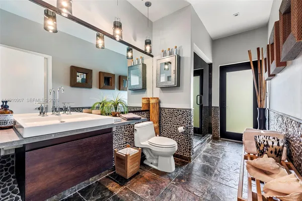 a view of a porch with a potted plant