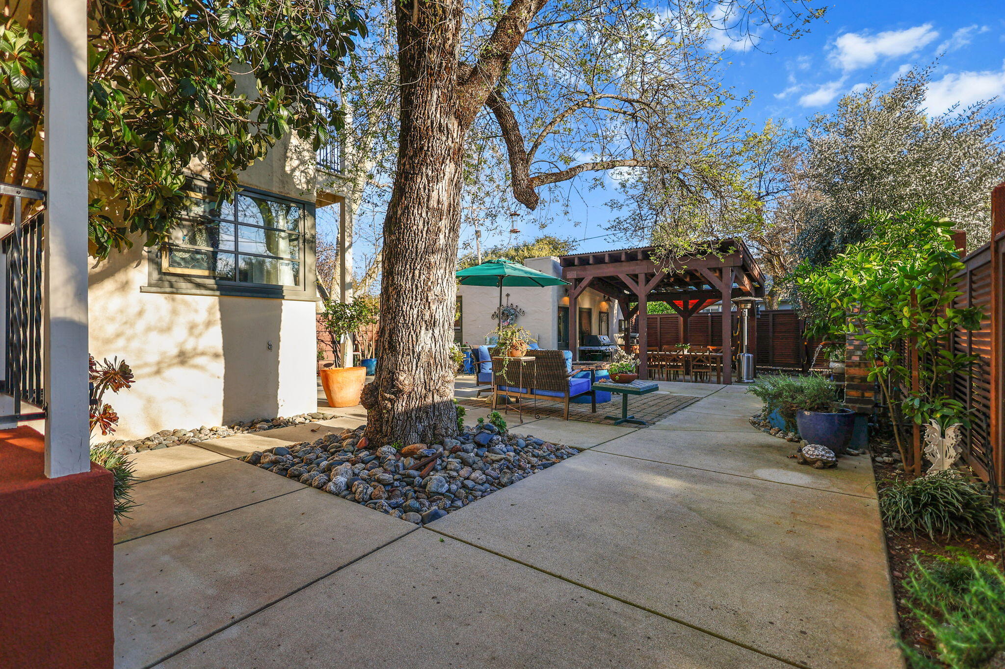 1465 Riverside Drive Redding, CA 96001 - Photo 140 of 163 a row of palm trees in front of a brick building