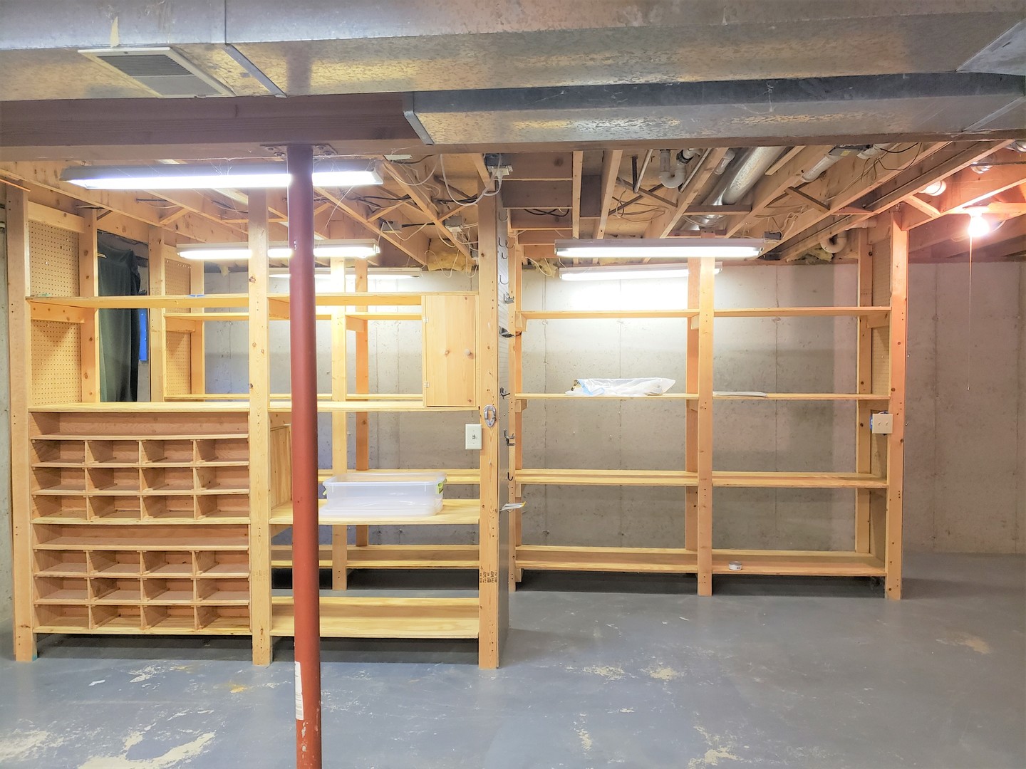 18719 Crowley Road Harvard, IL 60033 - Photo 20 of 22 a view of an empty room with wooden shelves