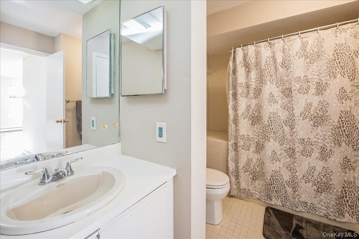 58 Villa Drive Peekskill, NY 10566 - Photo 18 of 21 Master Bathroom with vanity and light tile patterned floors