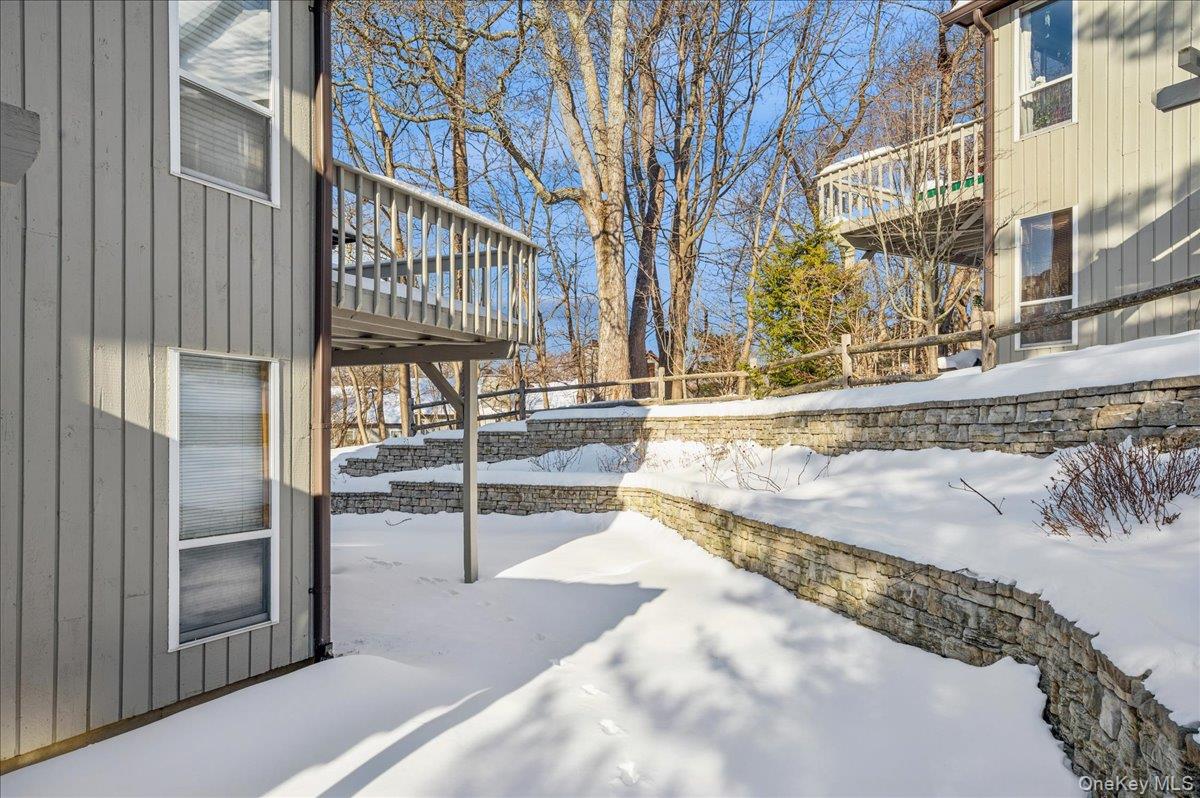 58 Villa Drive Peekskill, NY 10566 - Photo 20 of 21 Snow covered patio with a balcony