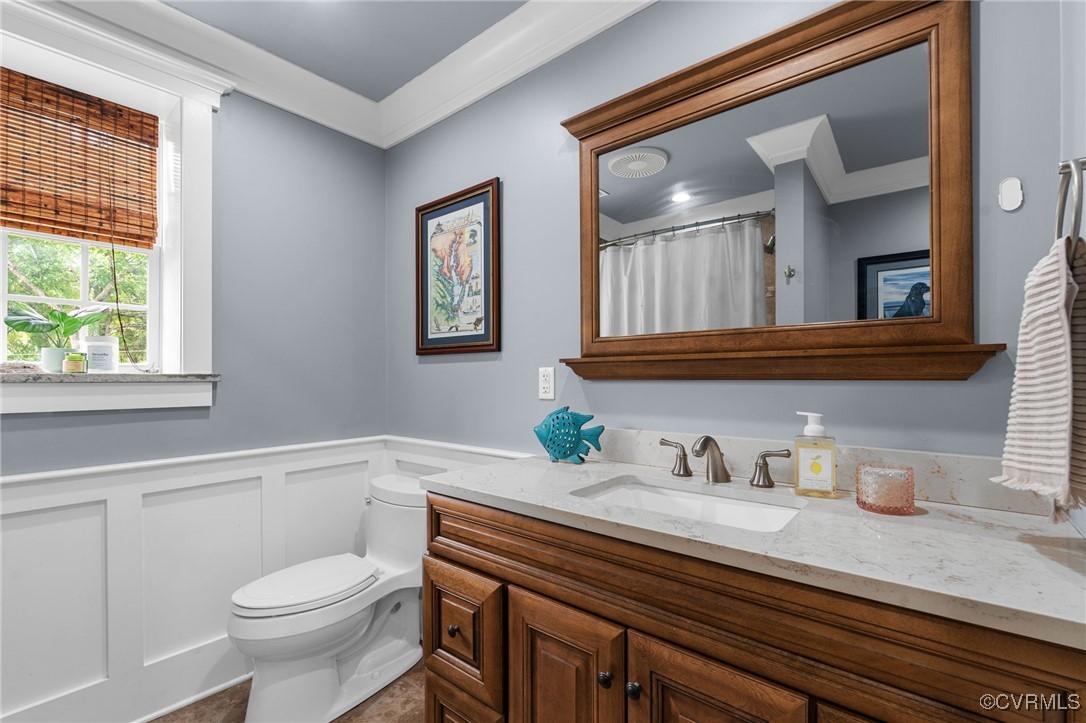 13923 White Oak Drive Lanexa, VA 23089 - Photo 11 of 46 a bathroom with a granite countertop sink a toilet and a window