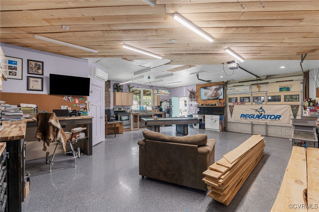 13923 White Oak Drive Lanexa, VA 23089 - Photo 14 of 46 a living room with furniture and a flat screen tv