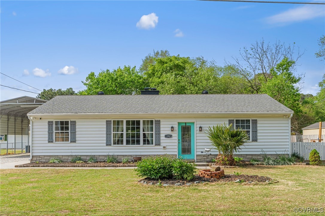 13923 White Oak Drive Lanexa, VA 23089 - Photo 21 of 46 a house with swimming pool in front of it