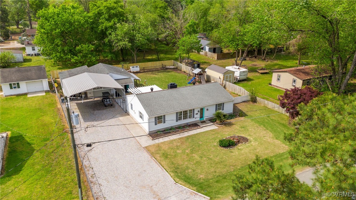 13923 White Oak Drive Lanexa, VA 23089 - Photo 28 of 46 an aerial view of a house with swimming pool and big yard