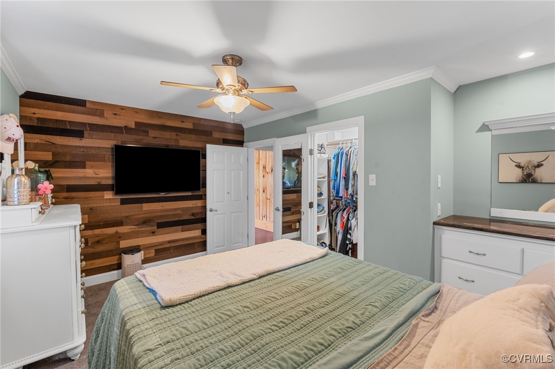 13923 White Oak Drive Lanexa, VA 23089 - Photo 32 of 46 a bedroom with a bed and a flat screen tv