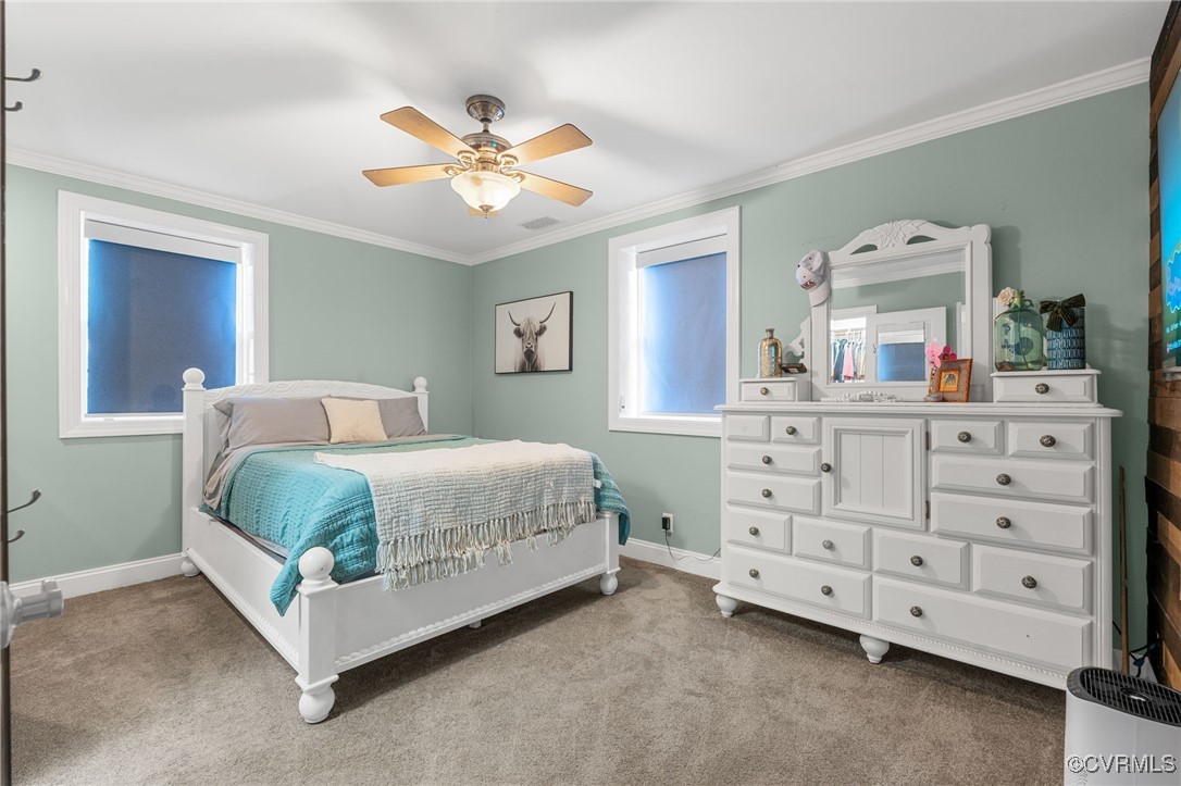 13923 White Oak Drive Lanexa, VA 23089 - Photo 34 of 46 a bedroom with a bed and a dresser