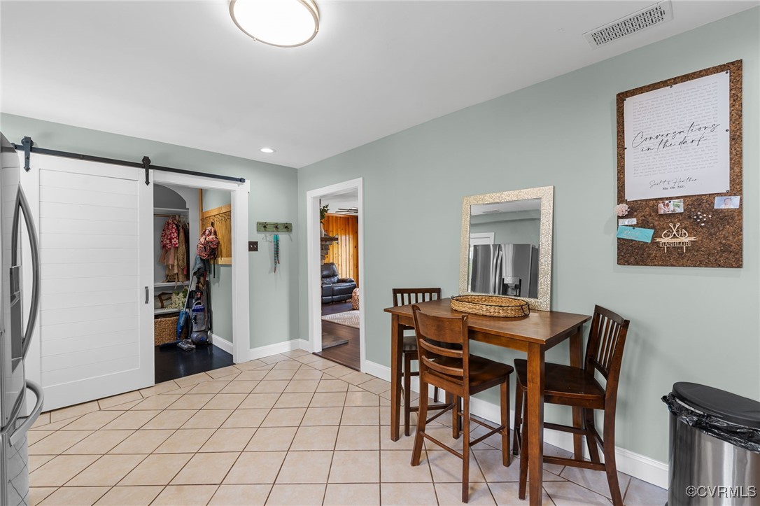 13923 White Oak Drive Lanexa, VA 23089 - Photo 37 of 46 a room that has a bed and a chair in it