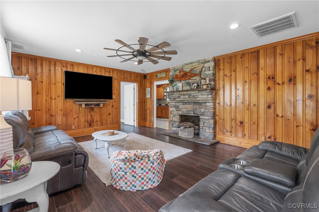 13923 White Oak Drive Lanexa, VA 23089 - Photo 44 of 46 a living room with furniture a flat screen tv and a fireplace