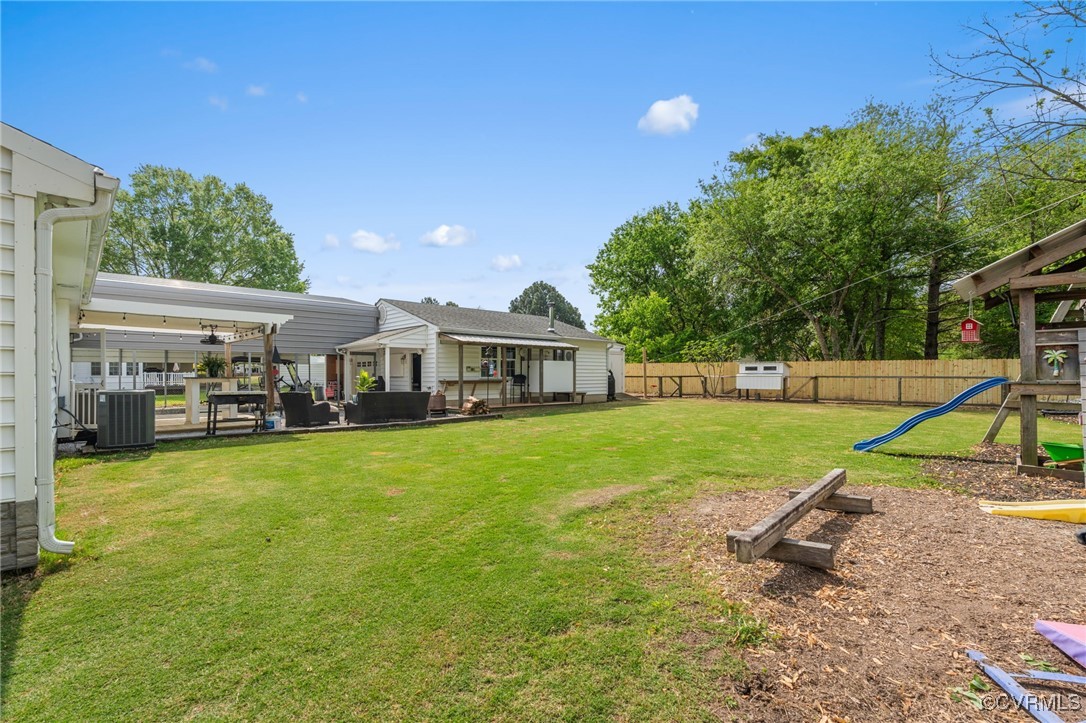 13923 White Oak Drive Lanexa, VA 23089 - Photo 45 of 46 a view of a house with backyard and a tree