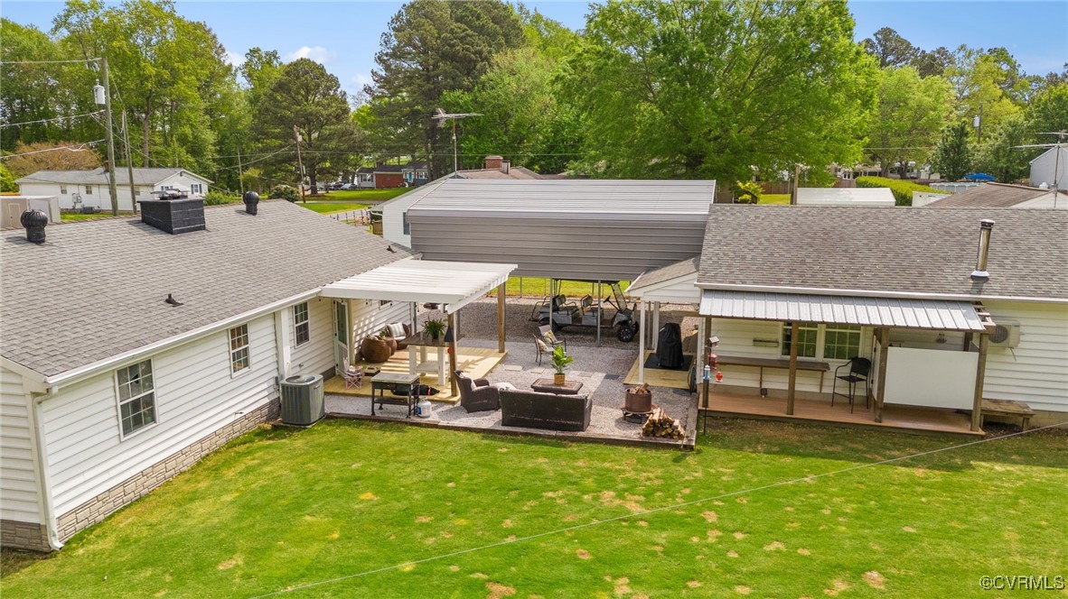 13923 White Oak Drive Lanexa, VA 23089 - Photo 7 of 46 an outdoor sitting area with furniture and garden