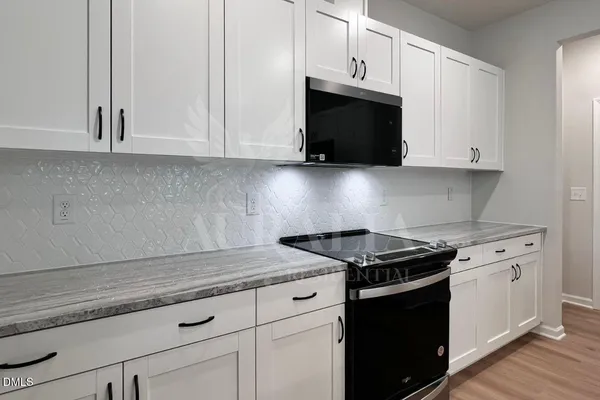 a view of a bathroom from the hallway