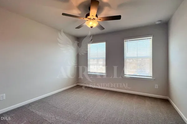 a bathroom with a sink double vanity and a mirror