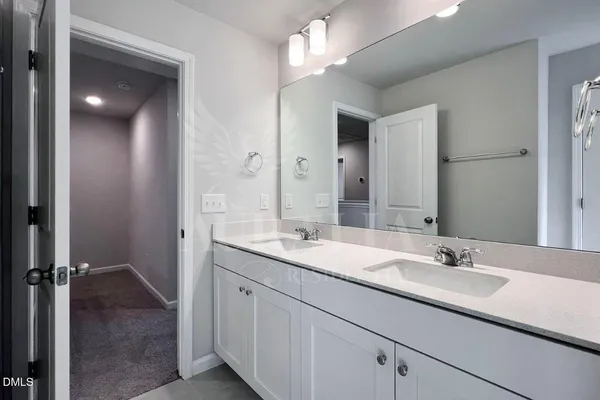 a bathroom with a tub and shower